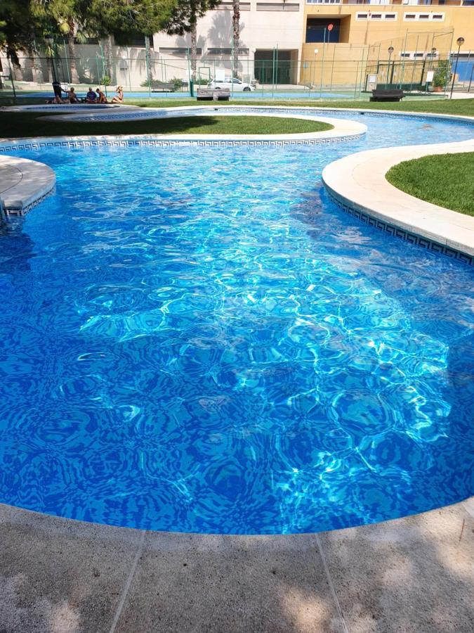 Apartment In Campoamor Overlooking The Swimming Pool Екстериор снимка