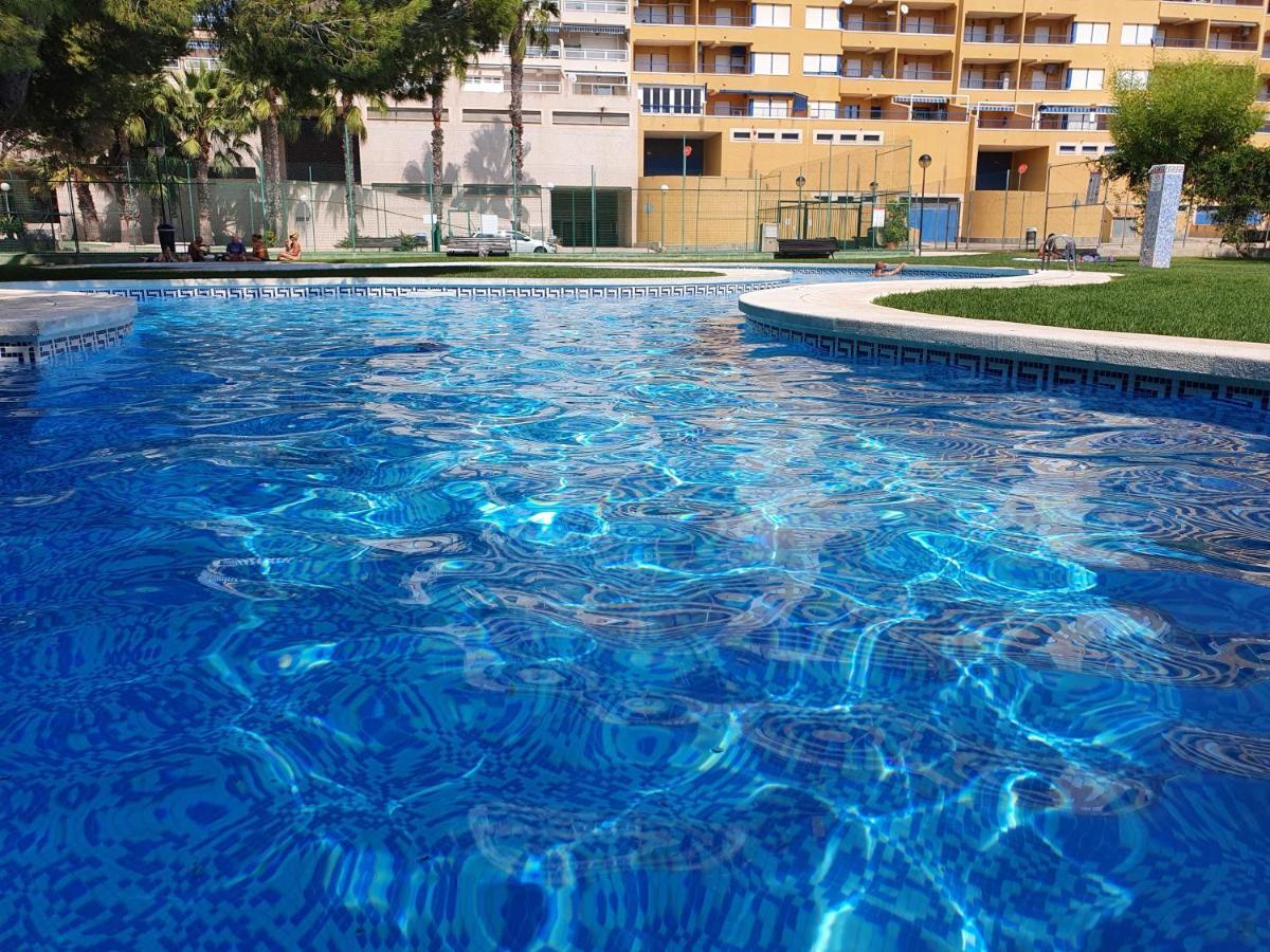 Apartment In Campoamor Overlooking The Swimming Pool Екстериор снимка