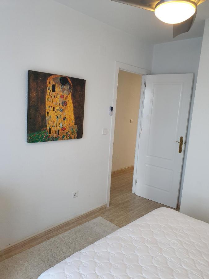 Apartment In Campoamor Overlooking The Swimming Pool Екстериор снимка