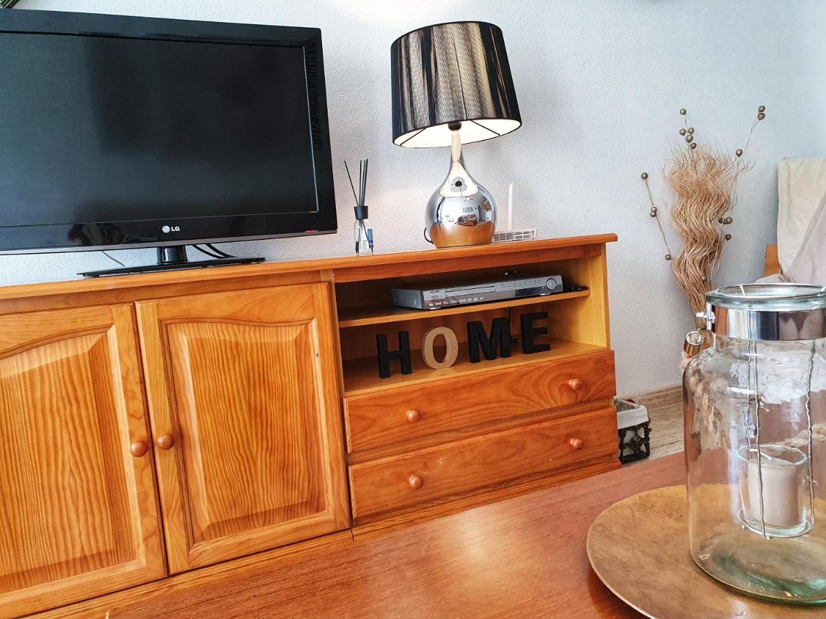 Apartment In Campoamor Overlooking The Swimming Pool Екстериор снимка
