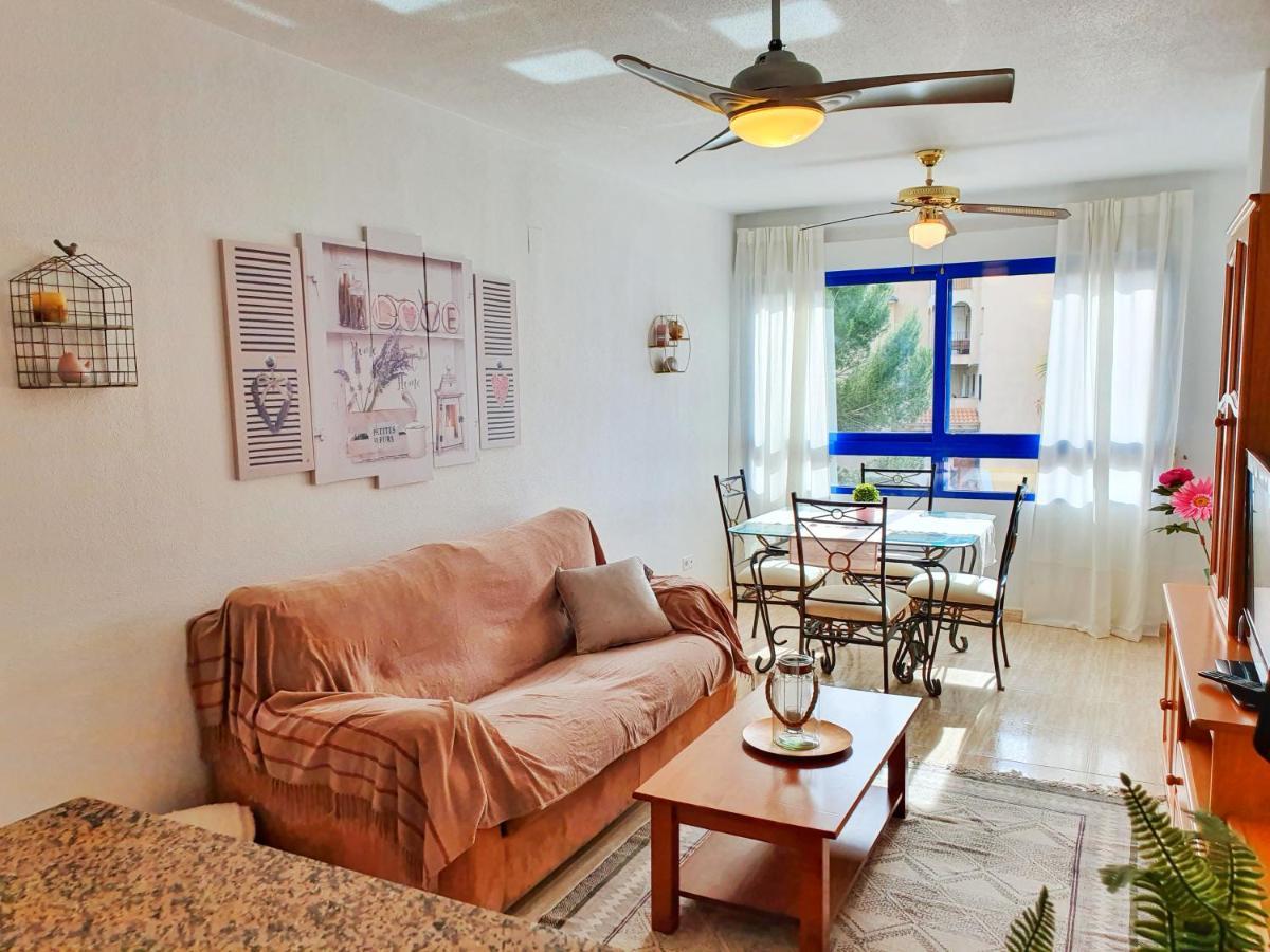 Apartment In Campoamor Overlooking The Swimming Pool Екстериор снимка