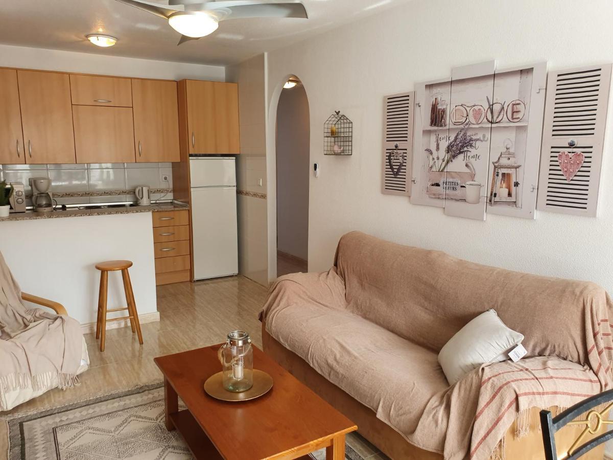 Apartment In Campoamor Overlooking The Swimming Pool Екстериор снимка