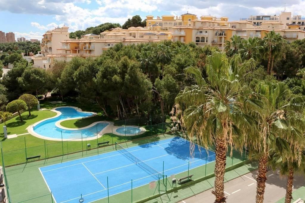 Apartment In Campoamor Overlooking The Swimming Pool Екстериор снимка