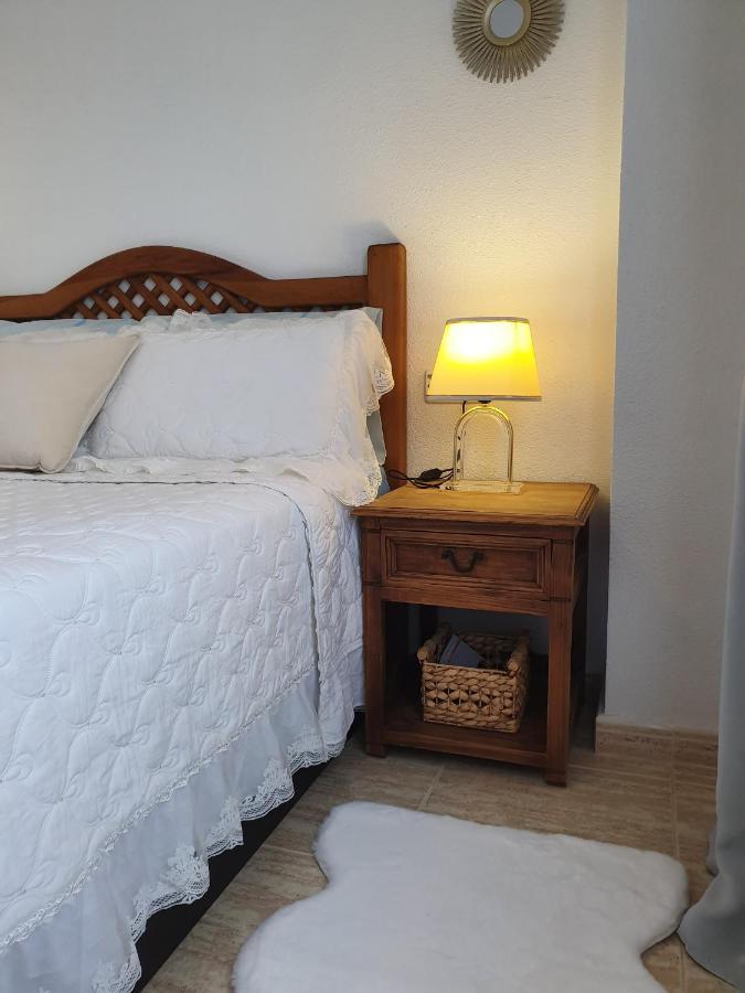 Apartment In Campoamor Overlooking The Swimming Pool Екстериор снимка