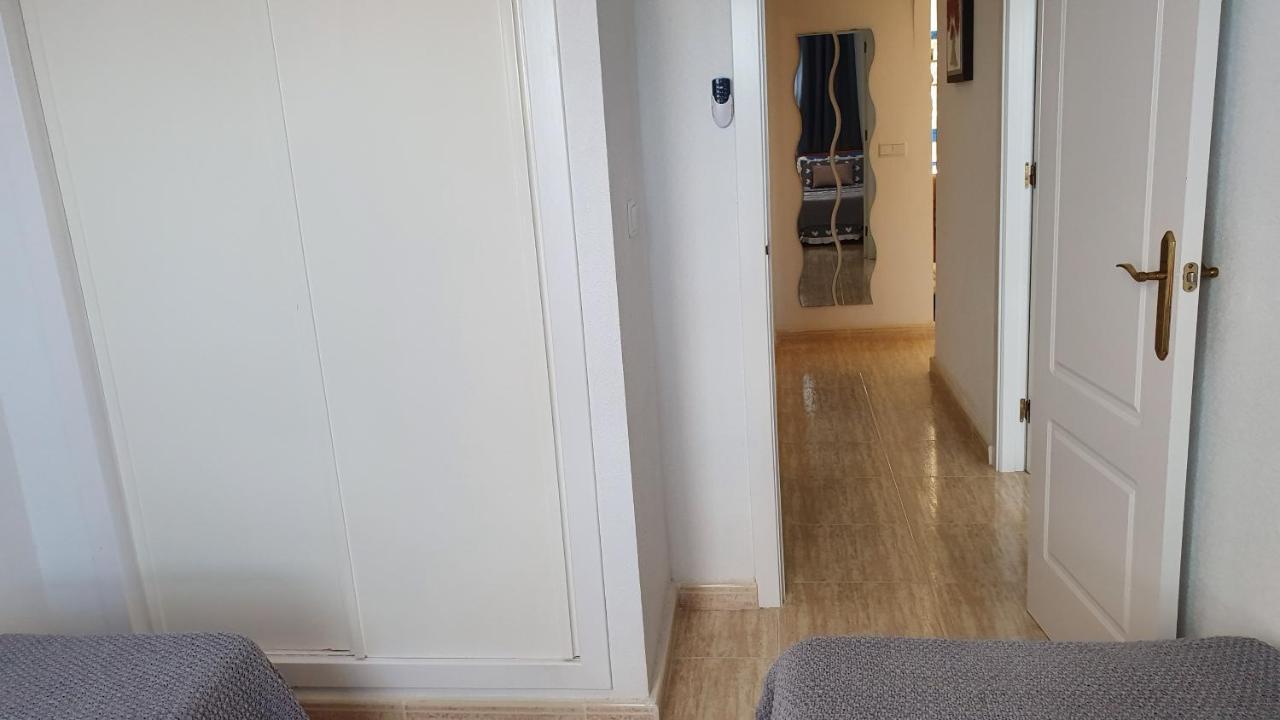 Apartment In Campoamor Overlooking The Swimming Pool Екстериор снимка