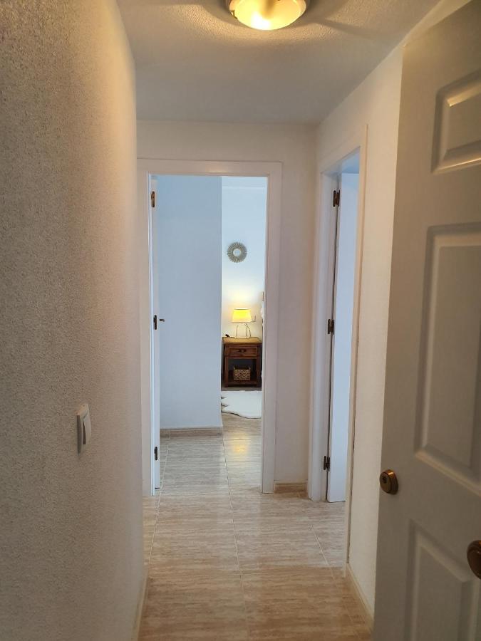 Apartment In Campoamor Overlooking The Swimming Pool Екстериор снимка