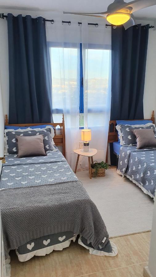 Apartment In Campoamor Overlooking The Swimming Pool Екстериор снимка