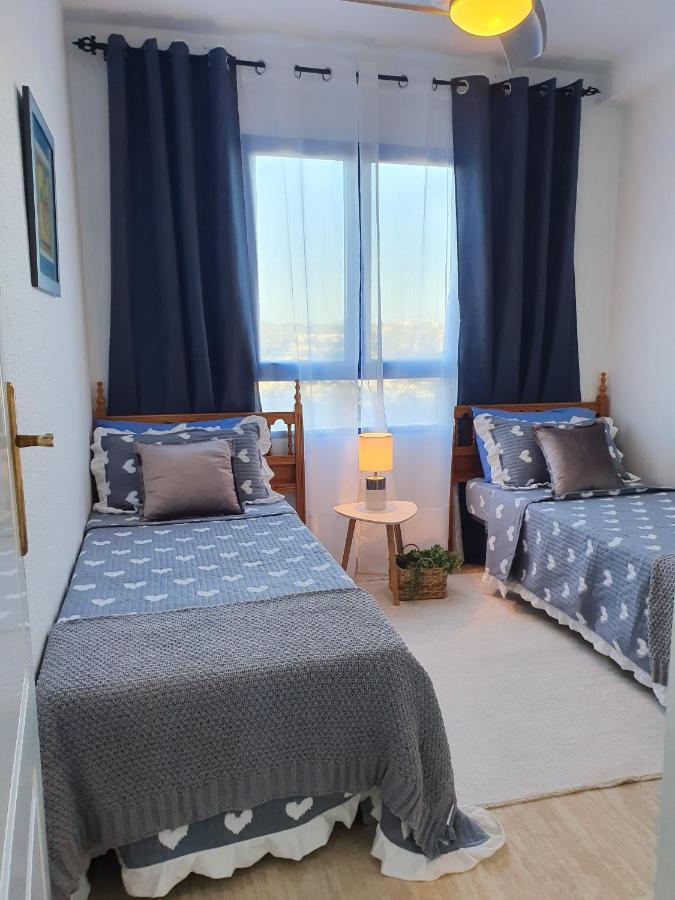 Apartment In Campoamor Overlooking The Swimming Pool Екстериор снимка