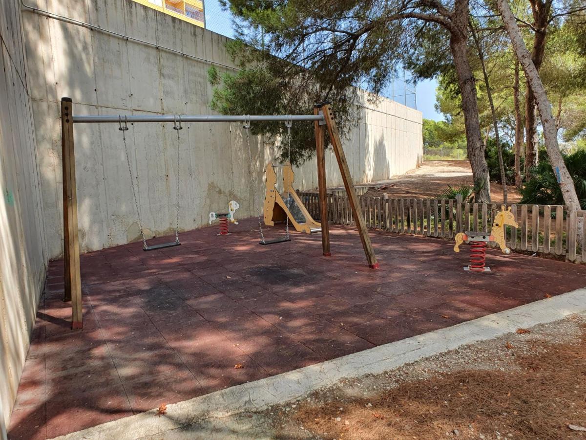 Apartment In Campoamor Overlooking The Swimming Pool Екстериор снимка