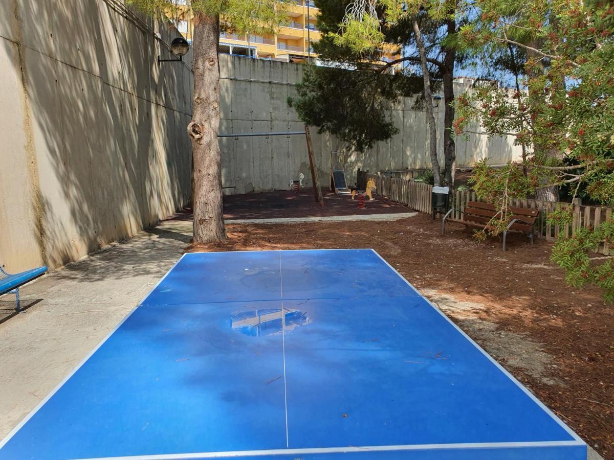 Apartment In Campoamor Overlooking The Swimming Pool Екстериор снимка