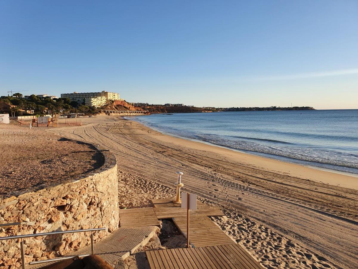 Apartment In Campoamor Overlooking The Swimming Pool Екстериор снимка