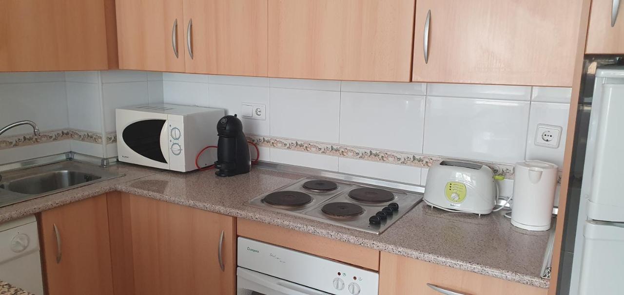 Apartment In Campoamor Overlooking The Swimming Pool Екстериор снимка