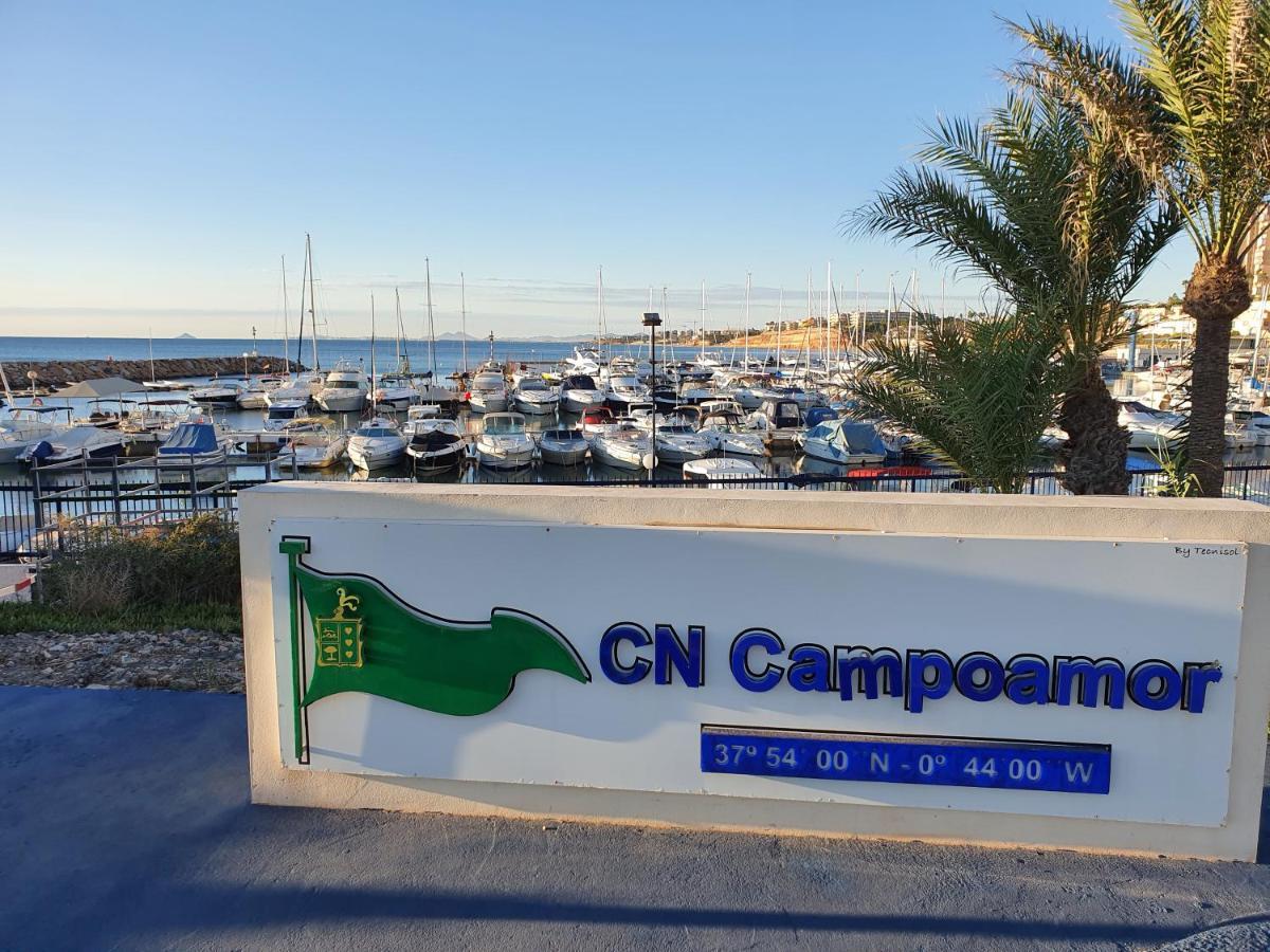 Apartment In Campoamor Overlooking The Swimming Pool Екстериор снимка