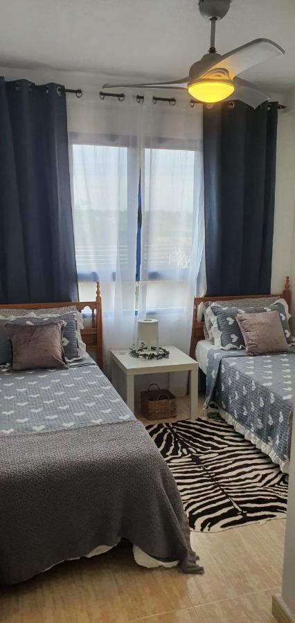 Apartment In Campoamor Overlooking The Swimming Pool Екстериор снимка